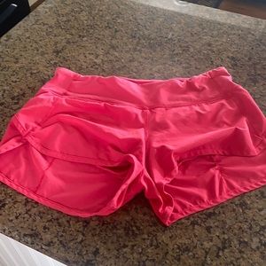 Pink Lululemon speed shorts size 4.